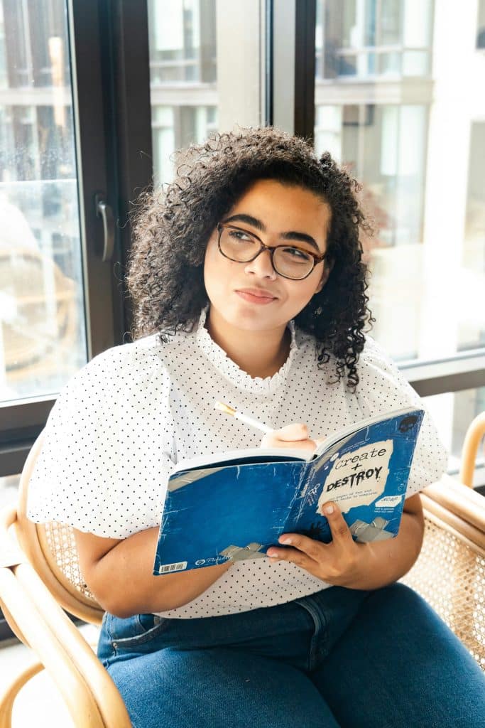 woman overthinking while reading